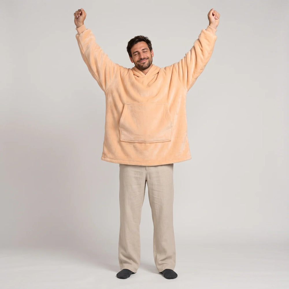 Worn detail of the Apricot blanket hoodie