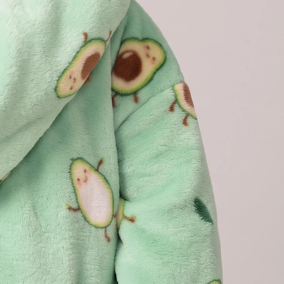 Worn detail of the Avocado Kids blanket hoodie: soft sleeves and pocket