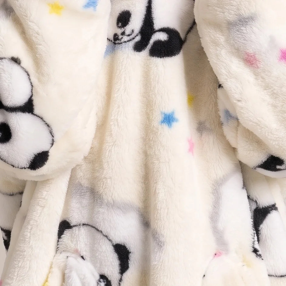 Worn detail of the Cream Pandas Kids blanket hoodie: soft sleeves and pocket