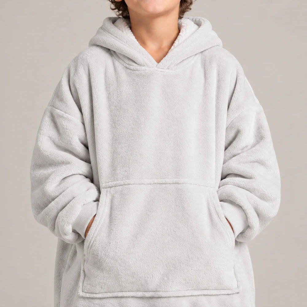 Worn detail of the Light Gray Kids blanket hoodie: soft sleeves and pocket
