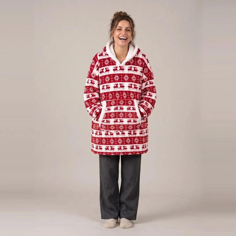Model wearing the Red Reindeer blanket hoodie, oversized unisex fit, studio photo
