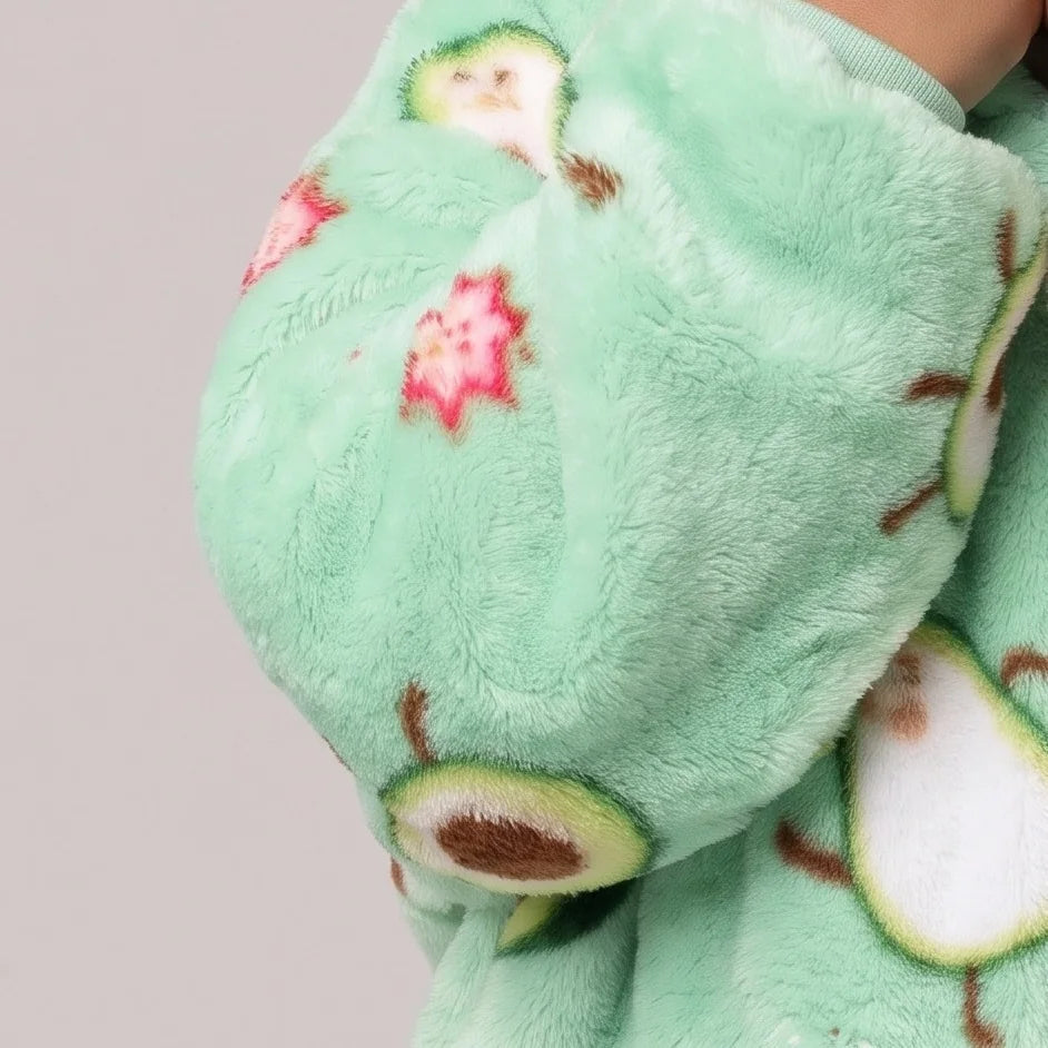 Worn detail of the Avocado Toddler blanket hoodie: soft sleeves and pocket