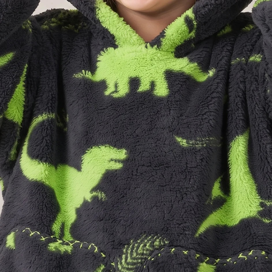 Worn detail of the Green Dinos Toddler blanket hoodie: soft sleeves and pocket