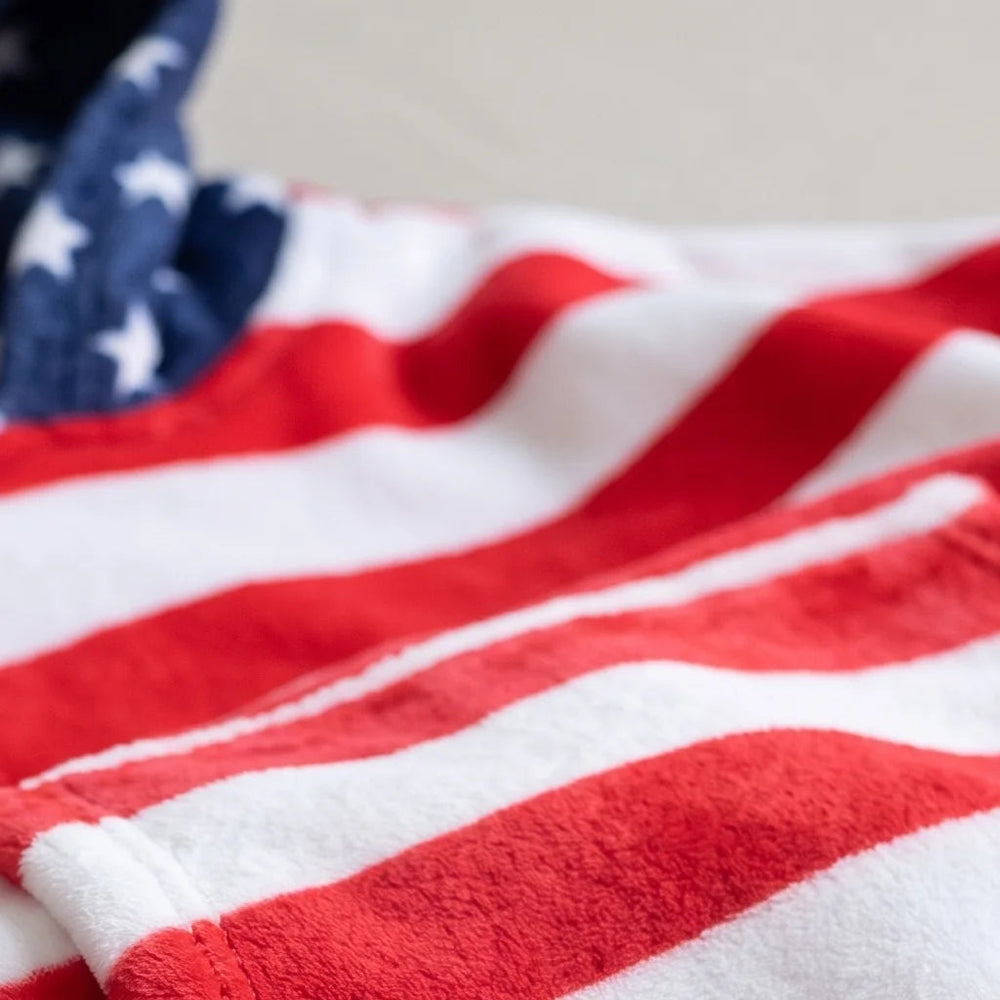 Close-up of the soft American Flag flannel and sherpa lining