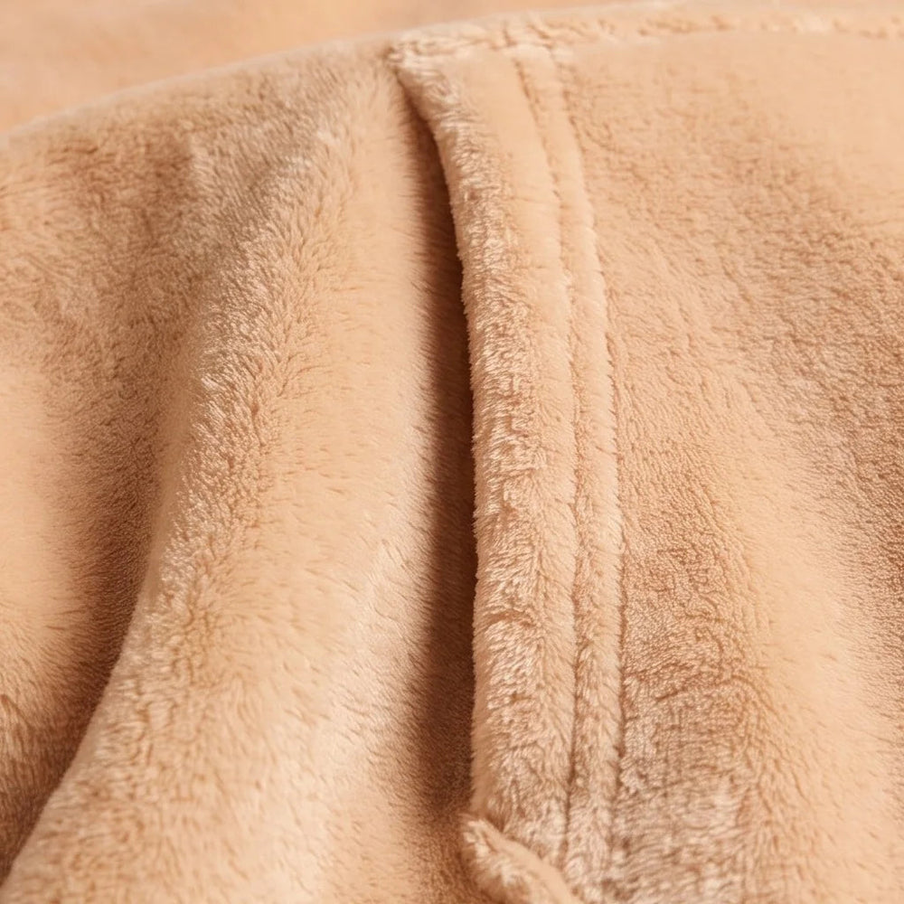 Close-up of the soft Apricot flannel and sherpa lining