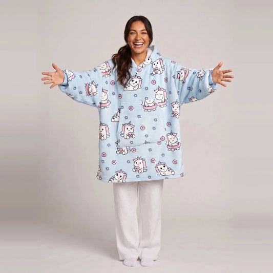 Model wearing the Blue Unicorn blanket hoodie, oversized unisex fit, studio photo