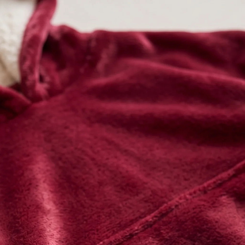 Close-up of the soft Burgundy flannel and sherpa lining