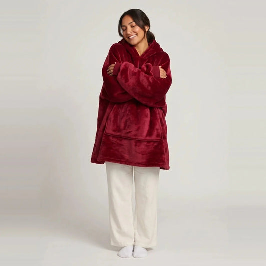 Model wearing the Burgundy blanket hoodie, oversized unisex fit, studio photo