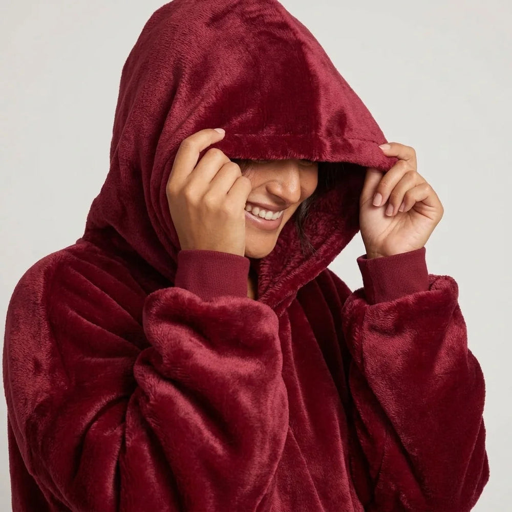 Worn detail of the Burgundy blanket hoodie