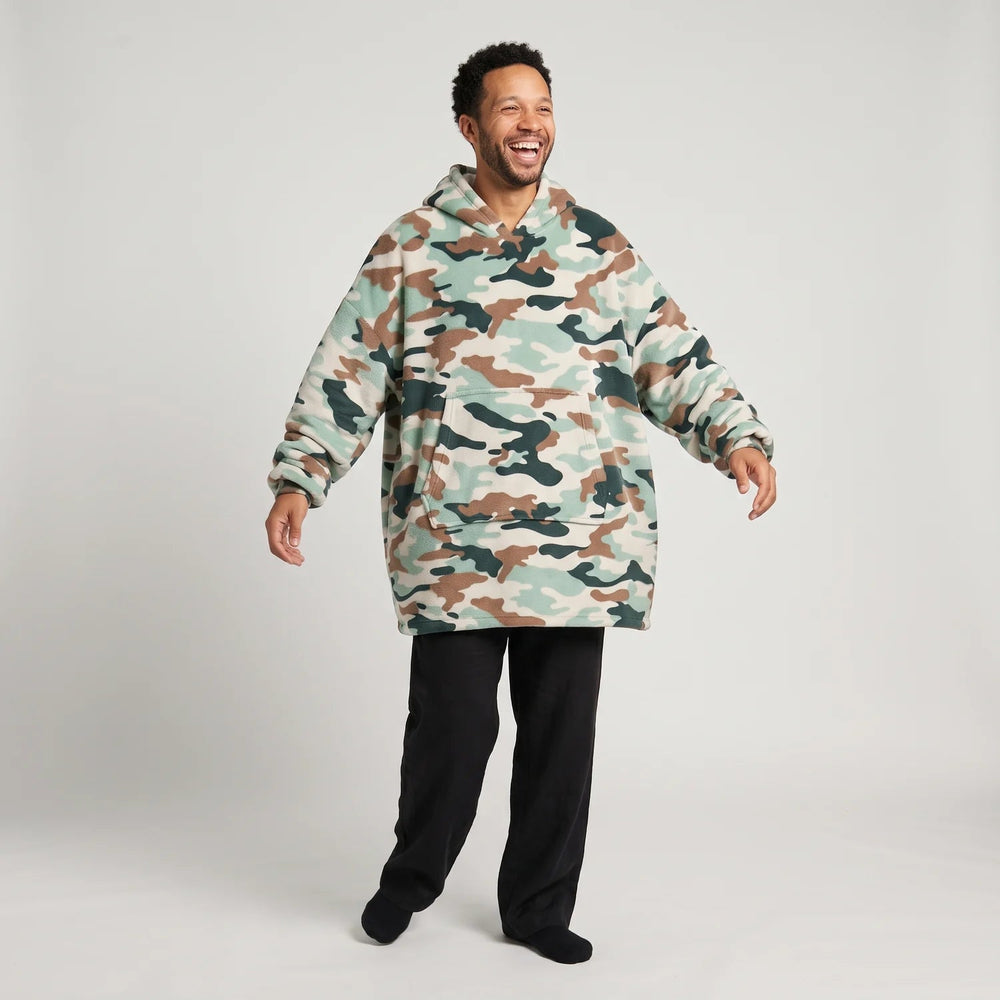 Man wearing the Camouflage blanket hoodie, unisex fit, studio photo