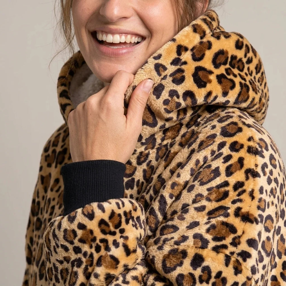 Worn detail of the Golden Leopard blanket hoodie
