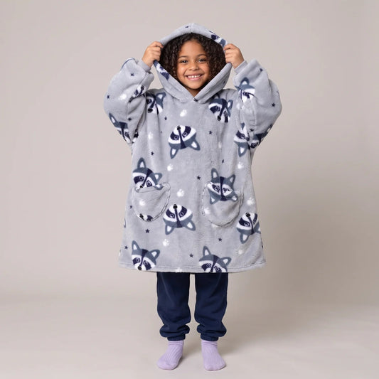 Child wearing the Raccoons Kids blanket hoodie, studio photo