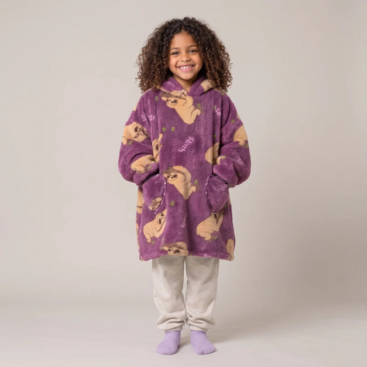 Child wearing the Sloths Kids blanket hoodie, studio photo