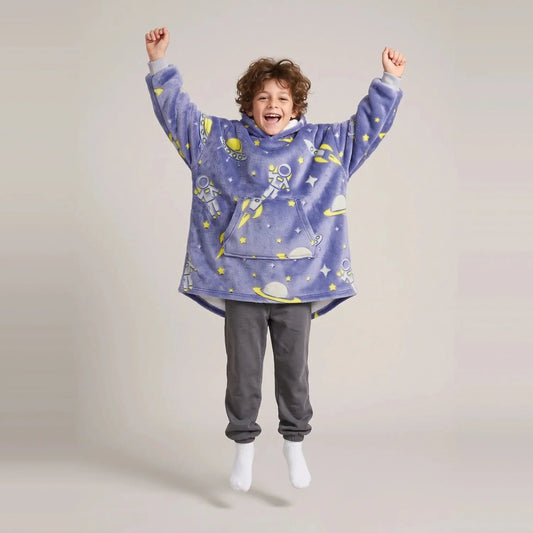 Child wearing the Space Astronauts Kids blanket hoodie, studio photo