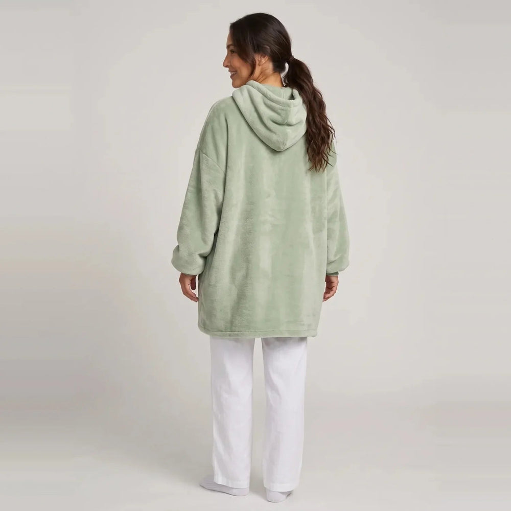 Back view of the Matcha Green blanket hoodie showing the hood and oversized fit