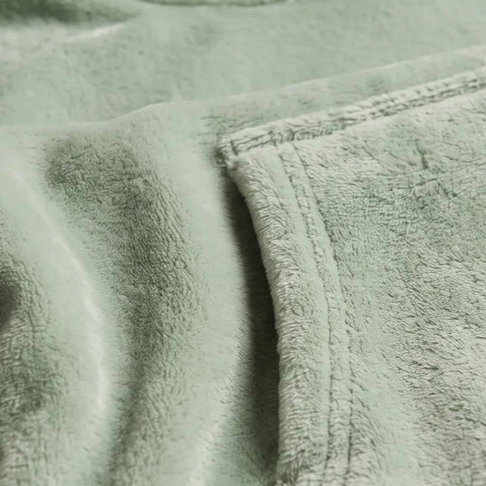 Close-up of the soft Matcha Green flannel and sherpa lining