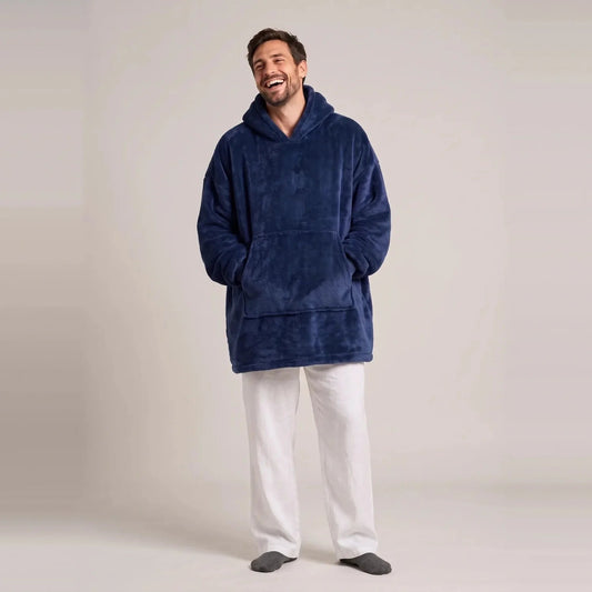 Model wearing the Navy Blue blanket hoodie, oversized unisex fit, studio photo