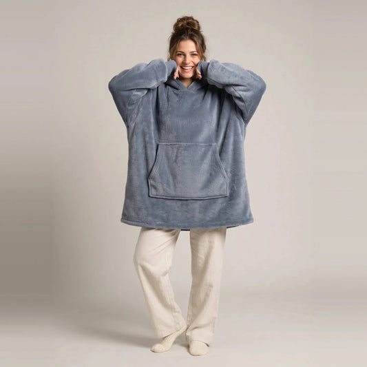 Model wearing the Slate Gray blanket hoodie, oversized unisex fit, studio photo