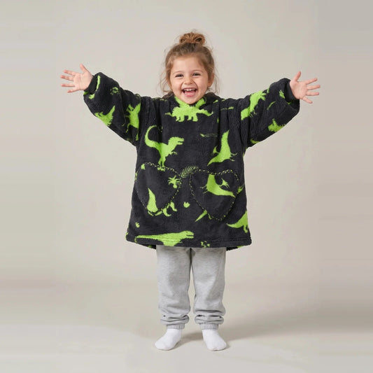 Toddler wearing the Green Dinos Toddler blanket hoodie, studio photo