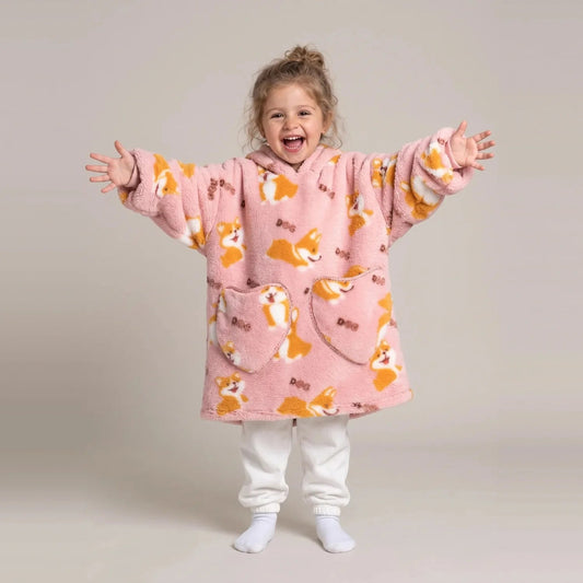 Toddler wearing the Pink Corgis Toddler blanket hoodie, studio photo